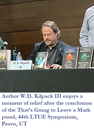 Author W.D. Kilpack III enjoys a moment of relief